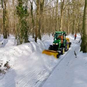 Snowplough on a bicycle road